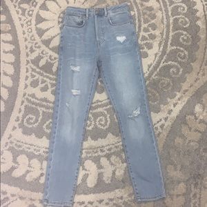 High waisted light blue jeans